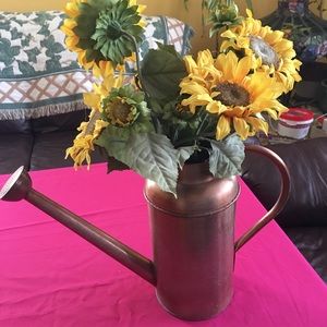 Copper watering can w artificial sunflowers